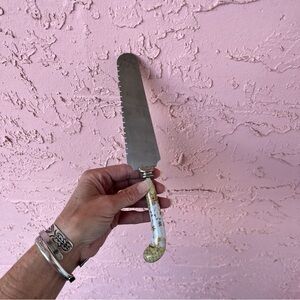 Antique Silver and Cream Serving Knife